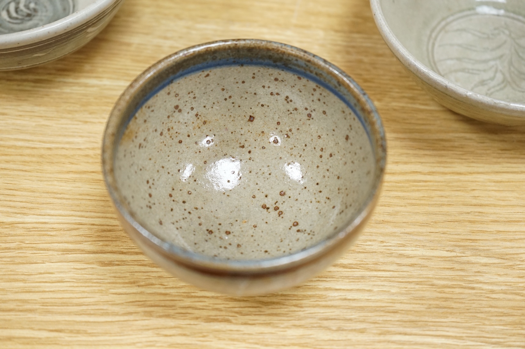 Six pieces of Studio pottery and a vase, largest 32cm high